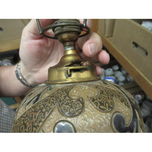 511 - Doulton Lambeth stoneware and gilt brass mounted oil lamp base, the incised stylised floral decorati... 