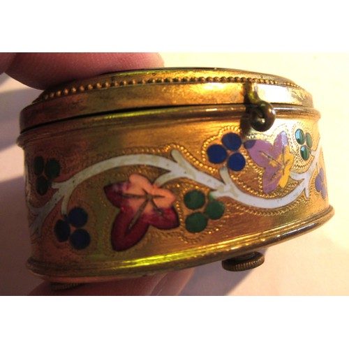 966 - Late 19th / early 20th Century gilt brass and enamel decorated oval trinket box, the hinged cover in... 