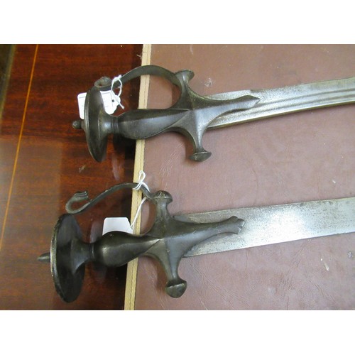 227 - Two 19th Century Indian tulwar swords, together with a replica sword and a fencing foil