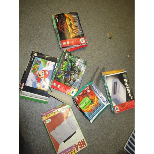 187 - Three boxes containing large quantity of assorted 1980's / 90's Atari and Nintendo games, together w... 