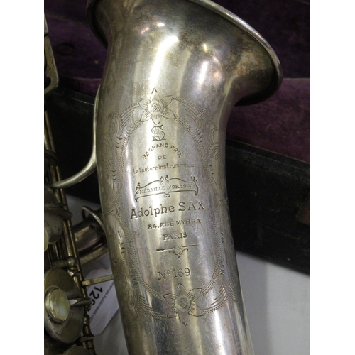 126 - Late 19th / early 20th Century silvered brass alto saxophone by Antoine-Joseph ' Adolphe ' Sax, 84, ... 