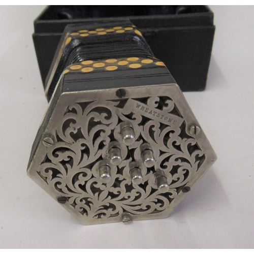 132 - Rare Wheatstone miniature twelve button concertina with pierced nickel plated octagonal end caps, Se... 