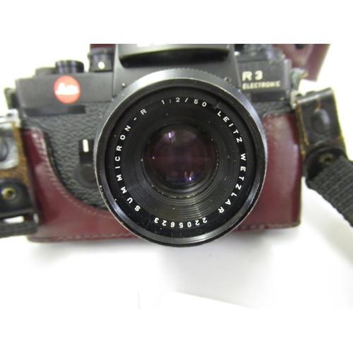 142 - Leica R3 electronic 35mm camera with Leitz Wetzlar Summicron-R 1:2/50mm lens, together with two Leic... 