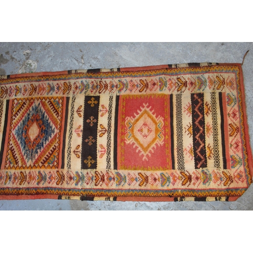 17 - Small runner with a Kelim and part piled triple medallion design, 7ft x 2ft 2ins approximately