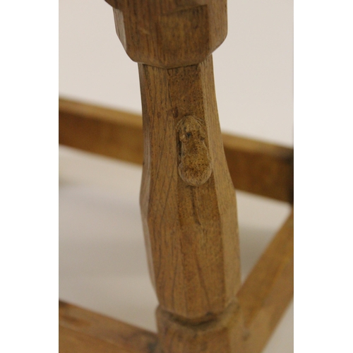 2009 - Robert Mouseman Thompson, small oak stool with a curved seat, raised on octagonal tapering supports ... 