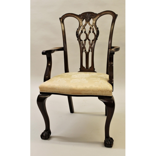 2010 - Set of nine (seven plus two) mahogany dining chairs in Chippendale style, the carved pierced splat b... 