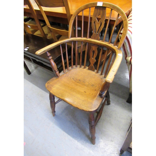 2014A - Early 19th Century elm hoop back Windsor chair with a spindle and pierced splat back, panel seat and... 