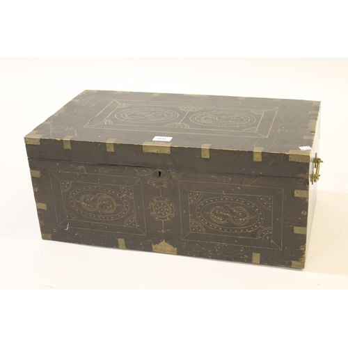 2018 - Indian carved hardwood and brass mounted trunk with side carrying handles and fitted interior