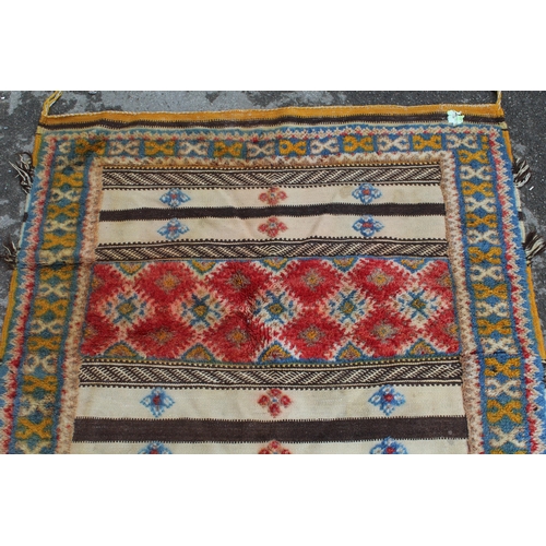 21 - Kelim and part piled rug of alternating panel design with borders, 6ft 8ins x 3ft 8ins approximately