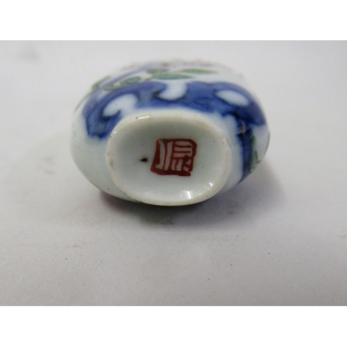 219 - Chinese porcelain enamel decorated snuff bottle