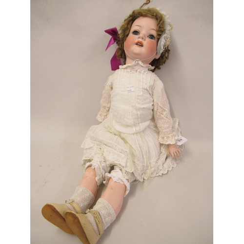 238 - Late 19th / early 20th Century Heubach Koppelsdorf bisque headed doll, numbered 302-9, 28ins high