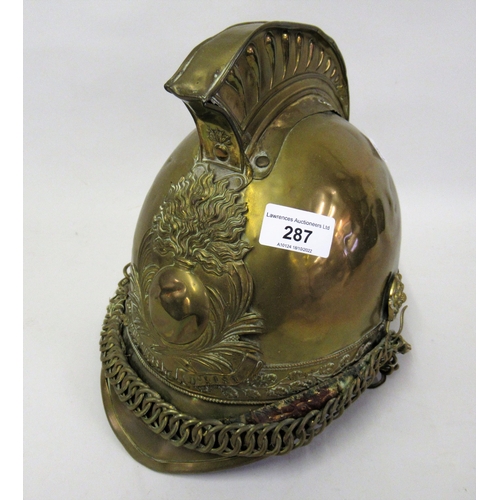 287 - Late 19th / early 20th Century French brass fireman's helmet, inscribed S.R.S Pompiers D'aisy