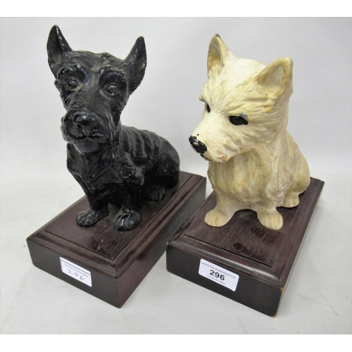 296 - Pair of painted metal ' Black and White Whisky ' advertising figures in the form of dogs, 9ins high ... 