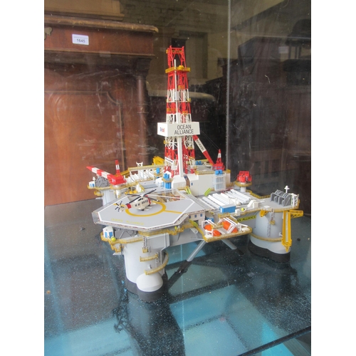 337 - Large scale model of the Ocean Alliance oil rig, housed in a perspex display case with painted woode... 