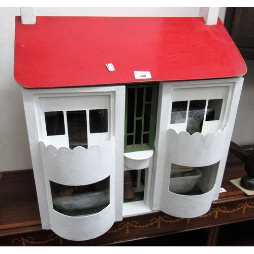 348 - Early 1950's red and white painted doll's house, together with a quantity of furniture