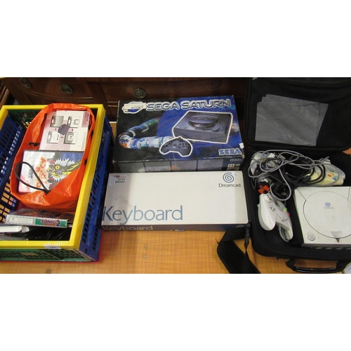 366 - Sega games console with original box, together with a quantity of other games consoles and various g... 