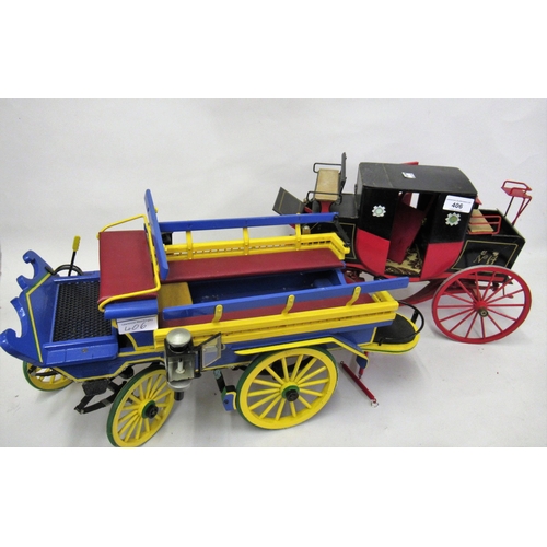 406 - Scratch built painted wooden model of a four wheeled carriage, together with another similar of an o... 