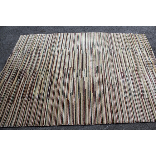 51 - Modern Tibetan rug with a striped design in shades of ivory, beige, green, red and yellow, 7ft 8ins ... 