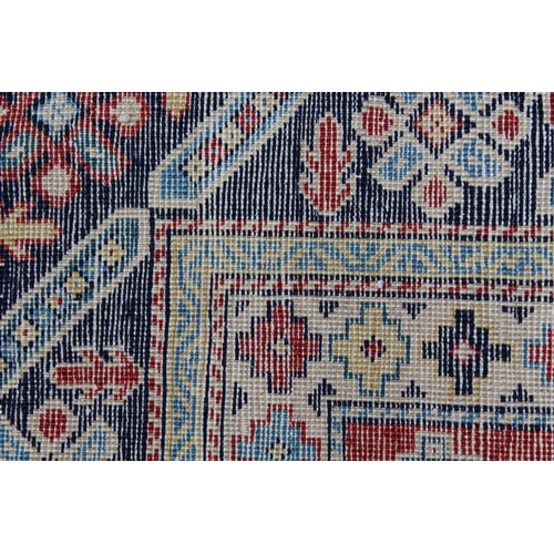 53 - Shirvan rug with eight medallion design on a brick red field with borders, 4ft 10ins x 3ft 8ins appr... 