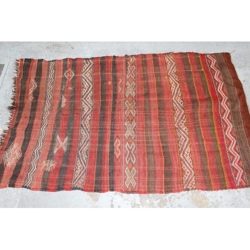 6 - Small Kelim rug with an all-over polychrome design, 3ft 4ins x 2ft 2ins approximately together with ... 