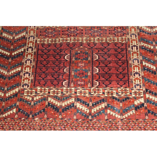 7 - Turkoman prayer rug with a twin panel Mihrab design on a wine ground with borders and skirt panel, 4... 