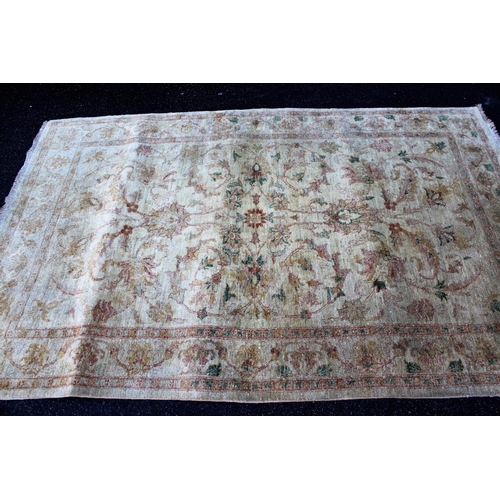 8 - Afghan Ziegler type rug with an all-over palmette and floral design on an ivory ground with borders,... 