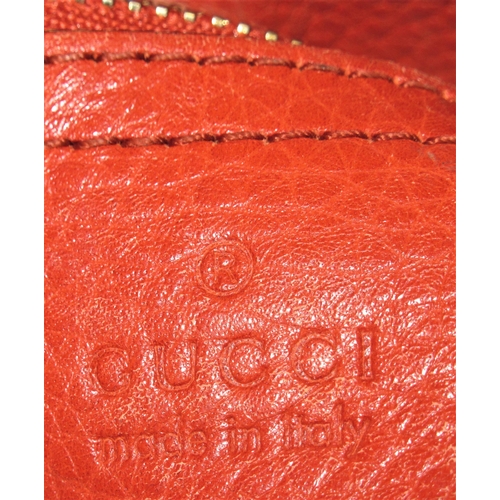 87 - Gucci, red leather bag with detachable shoulder strap, with dust bag