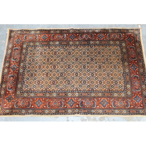 9 - Indo Persian rug with an all-over Herati design on an ivory ground with brick red borders, 5ft 2ins ... 