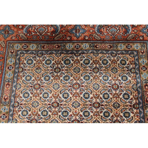 9 - Indo Persian rug with an all-over Herati design on an ivory ground with brick red borders, 5ft 2ins ... 