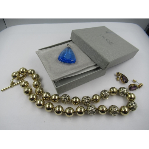 924 - Lalique pendant in original box, together with a Monet necklace and pair of earrings