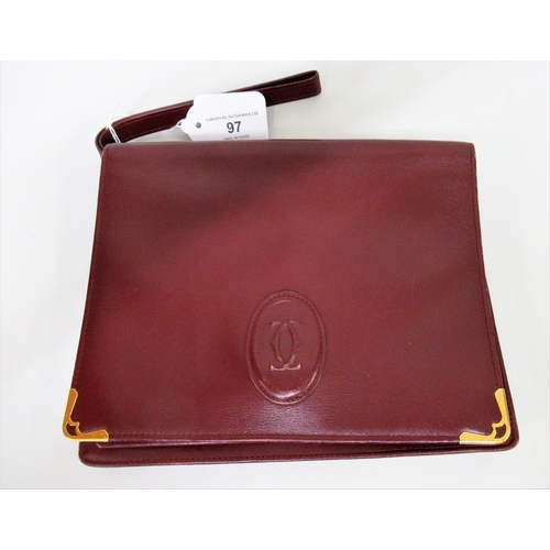 97 - Must de Cartier bordeaux leather pouch, with authenticity card and dust bag