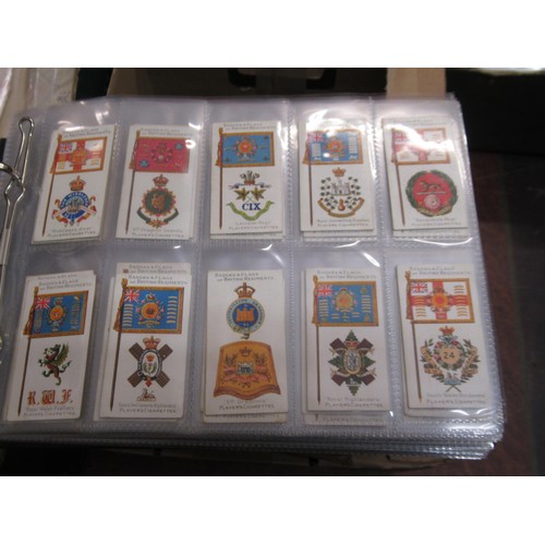 148 - Four albums containing various cigarette card odds including Wills, mainly non sport subjects