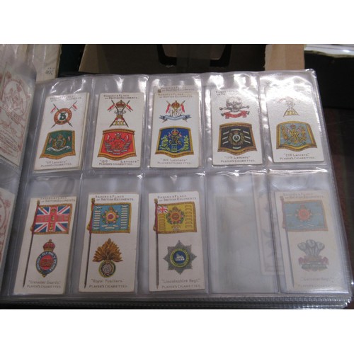 148 - Four albums containing various cigarette card odds including Wills, mainly non sport subjects