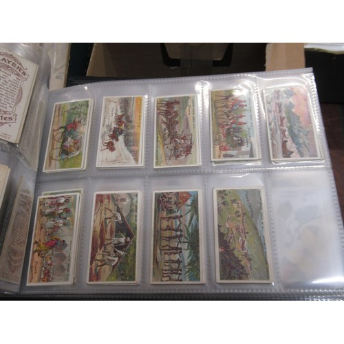 148 - Four albums containing various cigarette card odds including Wills, mainly non sport subjects