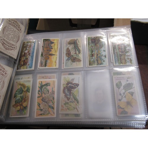 148 - Four albums containing various cigarette card odds including Wills, mainly non sport subjects