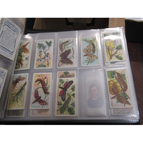 148 - Four albums containing various cigarette card odds including Wills, mainly non sport subjects