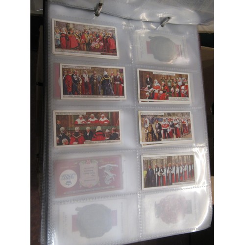 148 - Four albums containing various cigarette card odds including Wills, mainly non sport subjects