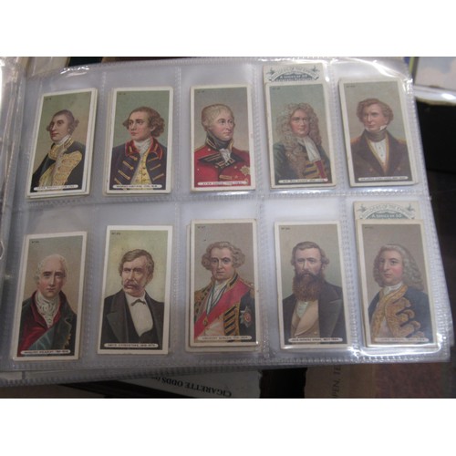 148 - Four albums containing various cigarette card odds including Wills, mainly non sport subjects