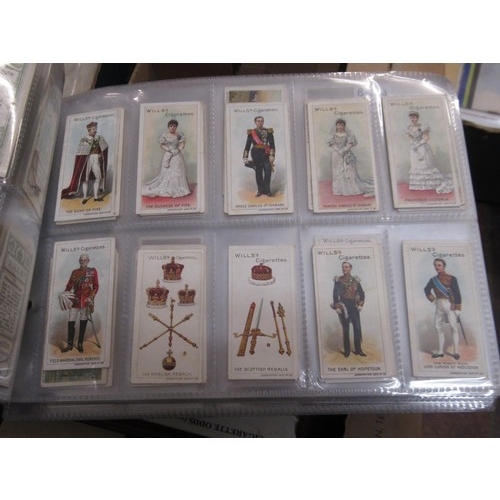 148 - Four albums containing various cigarette card odds including Wills, mainly non sport subjects