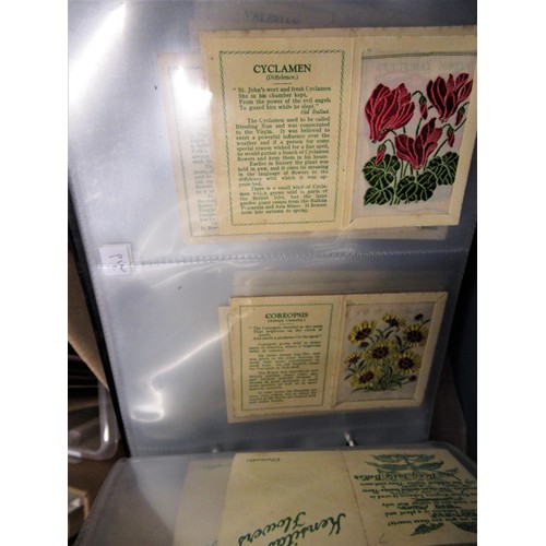 154 - Green album containing a quantity of sets of Kensita's silk flowers and a box containing a large qua... 