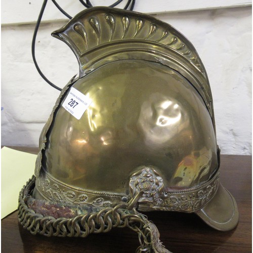 287 - Late 19th / early 20th Century French brass fireman's helmet, inscribed S.R.S Pompiers D'aisy