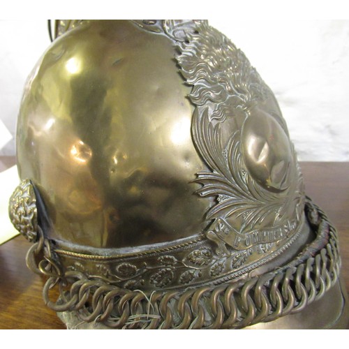 287 - Late 19th / early 20th Century French brass fireman's helmet, inscribed S.R.S Pompiers D'aisy