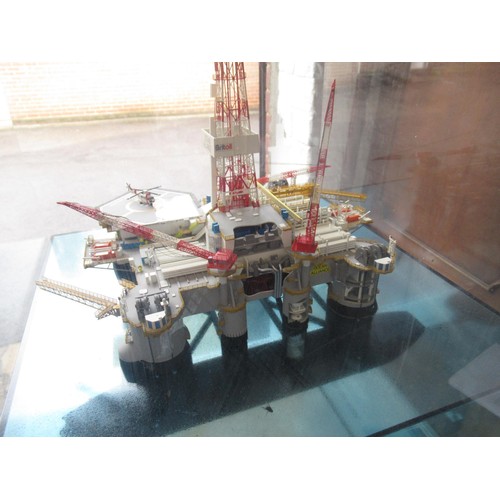 337 - Large scale model of the Ocean Alliance oil rig, housed in a perspex display case with painted woode... 