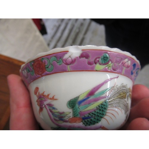 573 - Pair of small Chinese famille rose bowls, decorated with exotic birds and foliage, 4.25ins diameter ... 