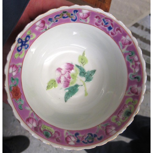 573 - Pair of small Chinese famille rose bowls, decorated with exotic birds and foliage, 4.25ins diameter ... 