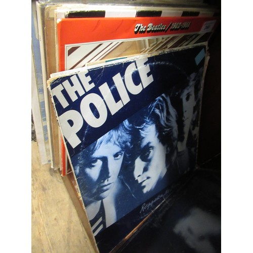 240 - Three boxes containing a large collection of 1960's LP's including Pink Floyd, The Beatles, Stevie W... 