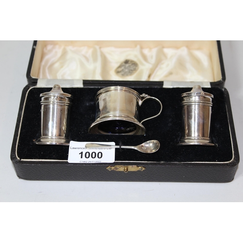 1000 - Cased Birmingham silver three piece condiment set of plain cylindrical form