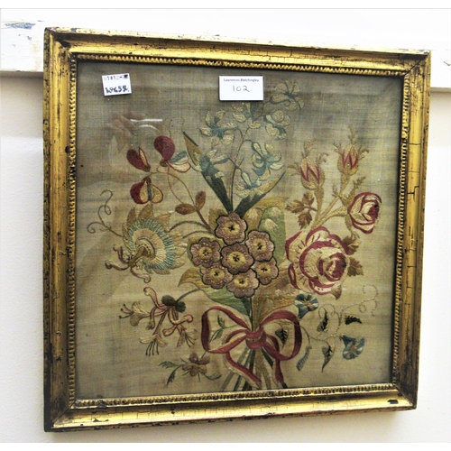 102 - Late 18th / early 19th Century silkwork picture, flower study (at fault), 20ins x 16ins approximatel... 