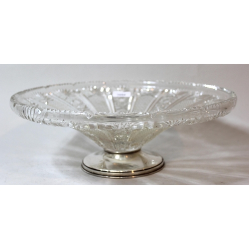 1054 - Large 20th Century cut glass fruit bowl on Continental circular silver footed base (at fault)