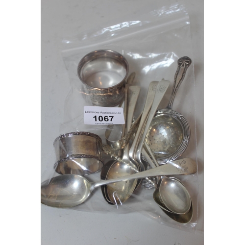 1067 - Set of six 19th Century silver teaspoons, two silver napkin rings, silver tea strainer and a small q... 